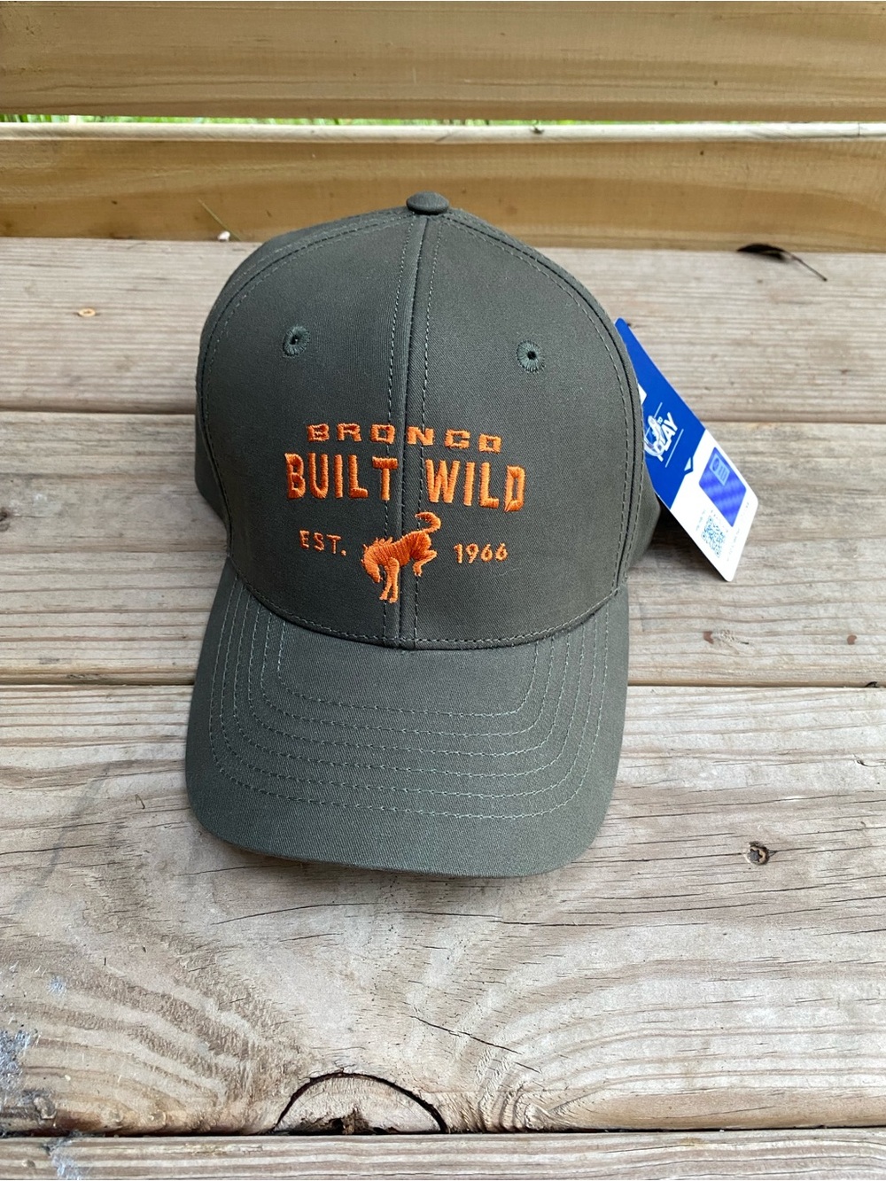 Built Wild Bronco Olive Green Baseball Cap with Orange Embroidery